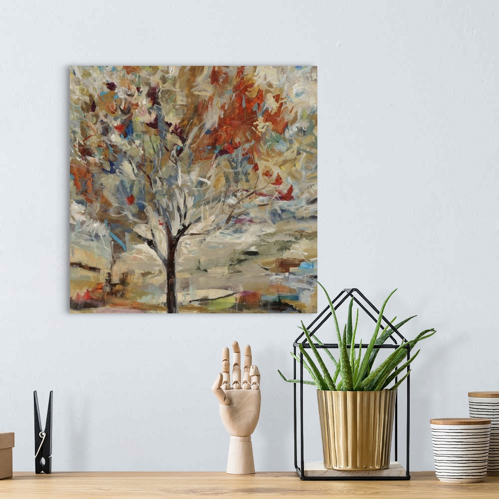 A bohemian room featuring Contemporary painting of a single tree with vibrant leaves and branches, on a background filled w...