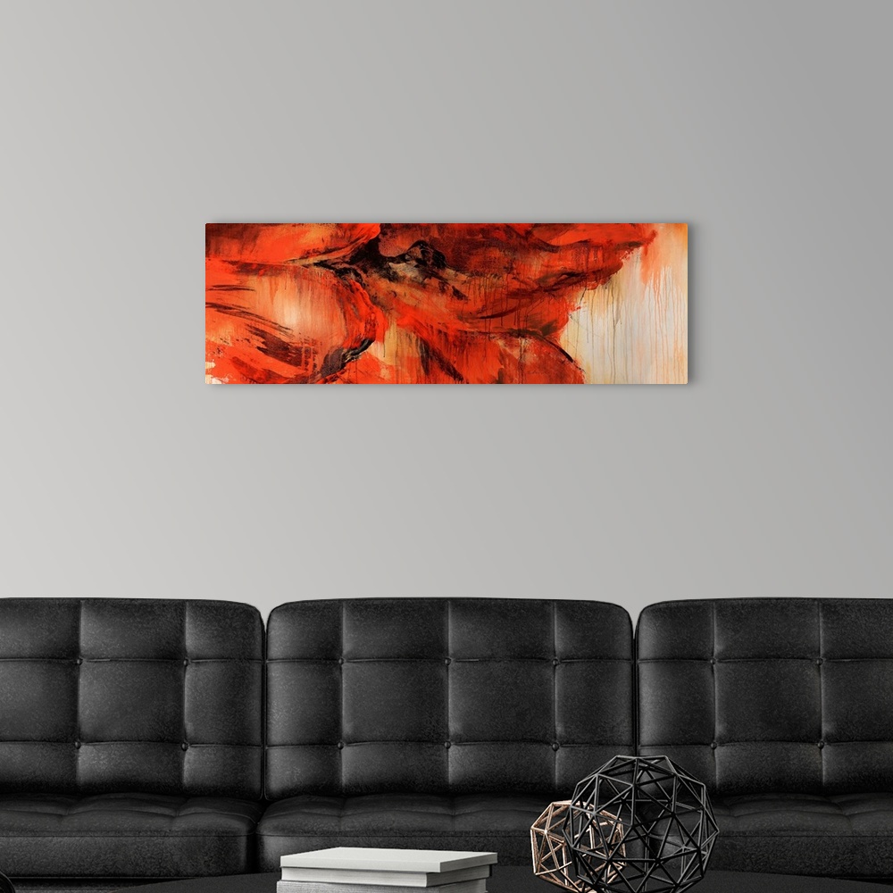 A modern room featuring An abstract piece of a very large red flower that has the paint dripping throughout the piece.