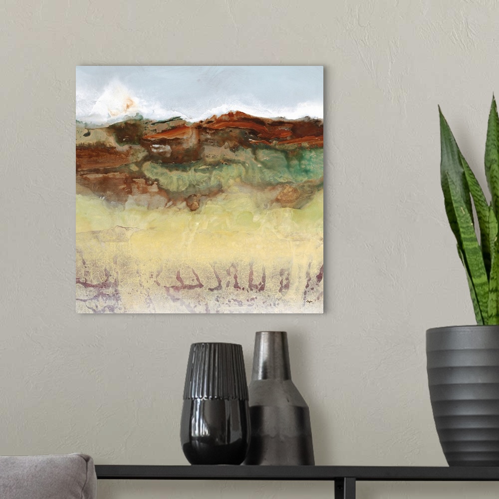 A modern room featuring Contemporary landscape painting of a desert view with red mountains on the horizon.