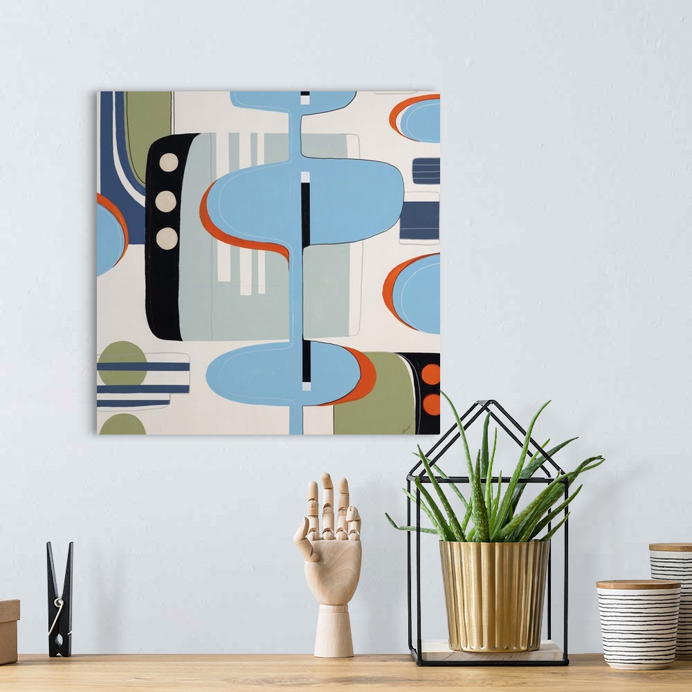 A bohemian room featuring Contemporary painting of colorful retro looking shapes and designs.