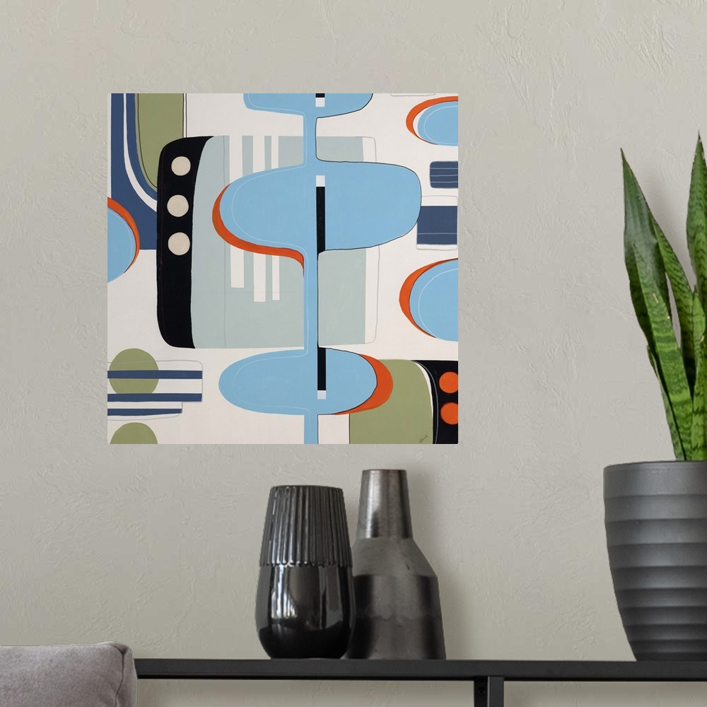 A modern room featuring Contemporary painting of colorful retro looking shapes and designs.