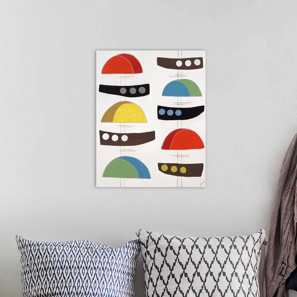 A bohemian room featuring Contemporary painting of colorful retro looking shapes and designs.
