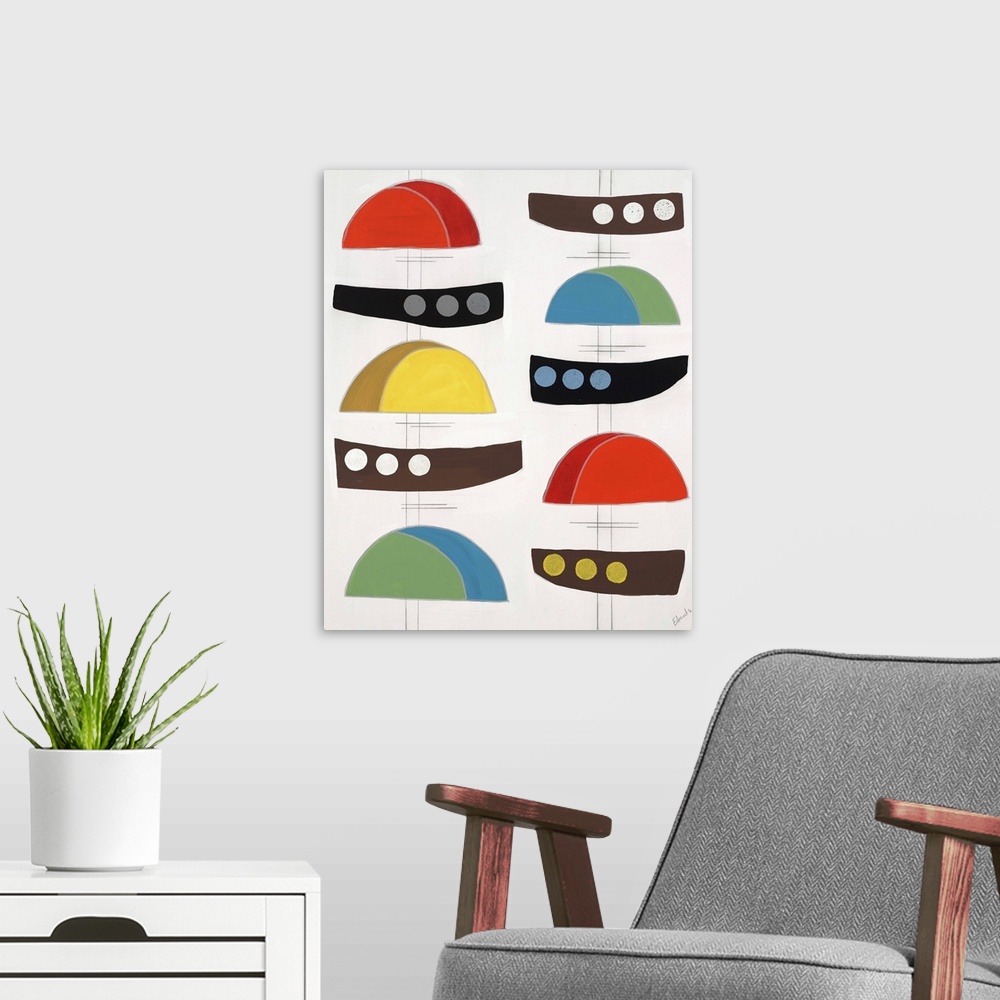 A modern room featuring Contemporary painting of colorful retro looking shapes and designs.
