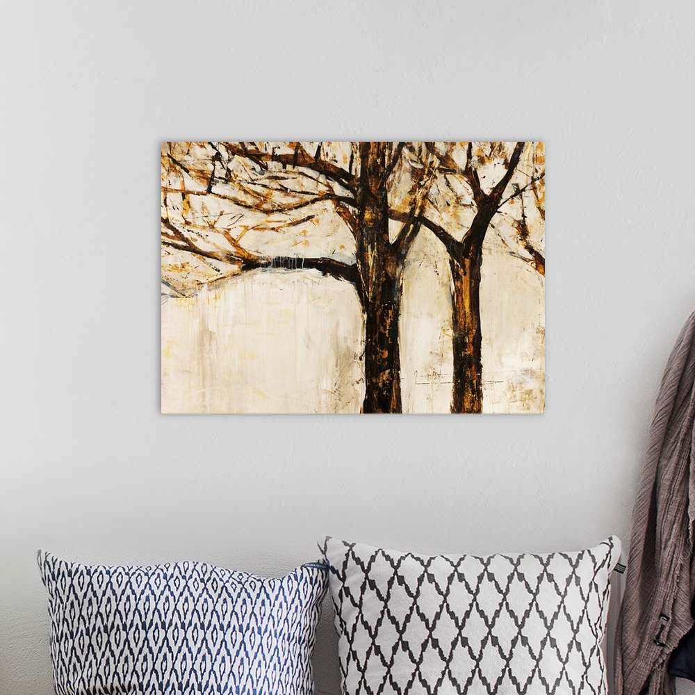 A bohemian room featuring Contemporary artwork of a line of three bare trees painted against an off white background.