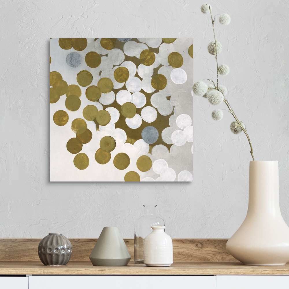 A farmhouse room featuring Contemporary abstract artwork made of white and gold dots.