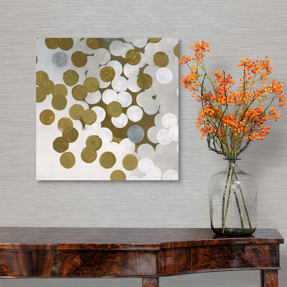 A traditional room featuring Contemporary abstract artwork made of white and gold dots.