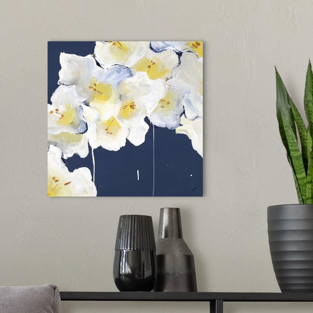 A modern room featuring Square painting of a bouquet of white Rhododendrons against a dark blue backdrop.