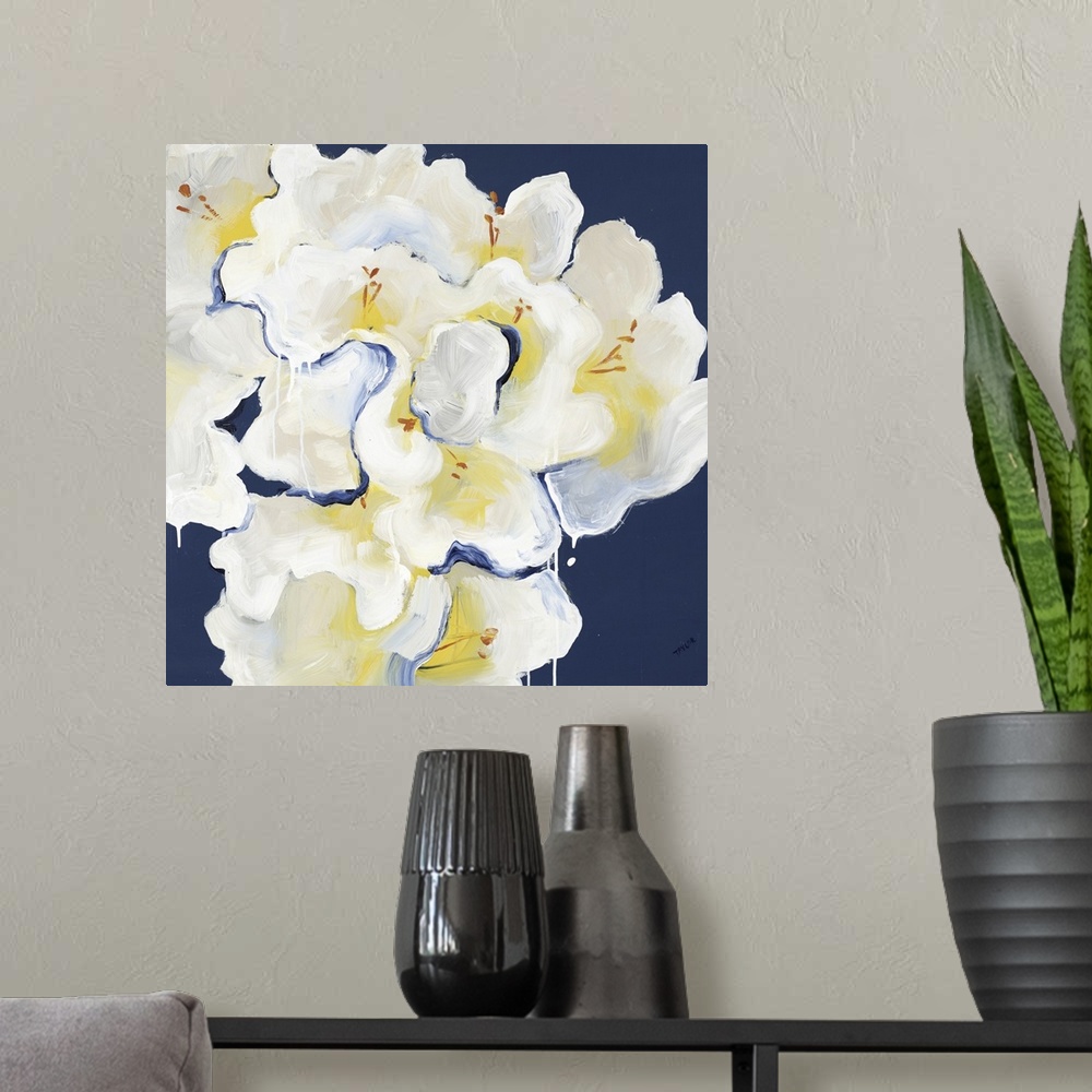 A modern room featuring Square painting of a bouquet of white Rhododendrons against a dark blue backdrop.