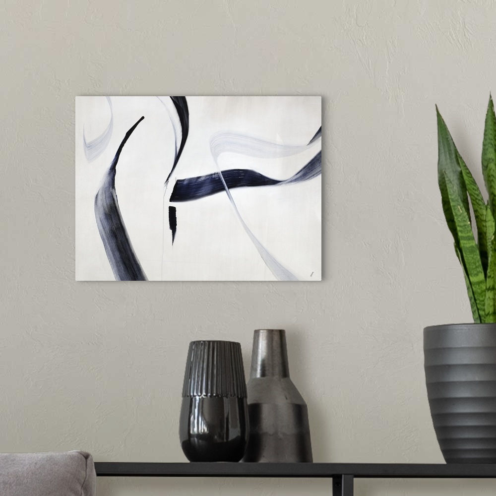 A modern room featuring Bold brush strokes of dark blue and gray, in the appearance of a floating ribbon, against a white...