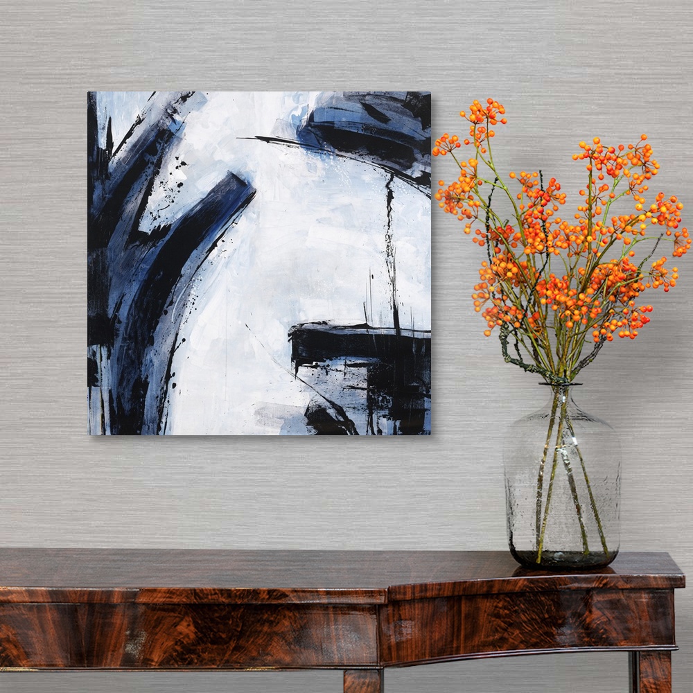 A traditional room featuring Abstract painting using dark blue and black colors against a pale blue blue background.