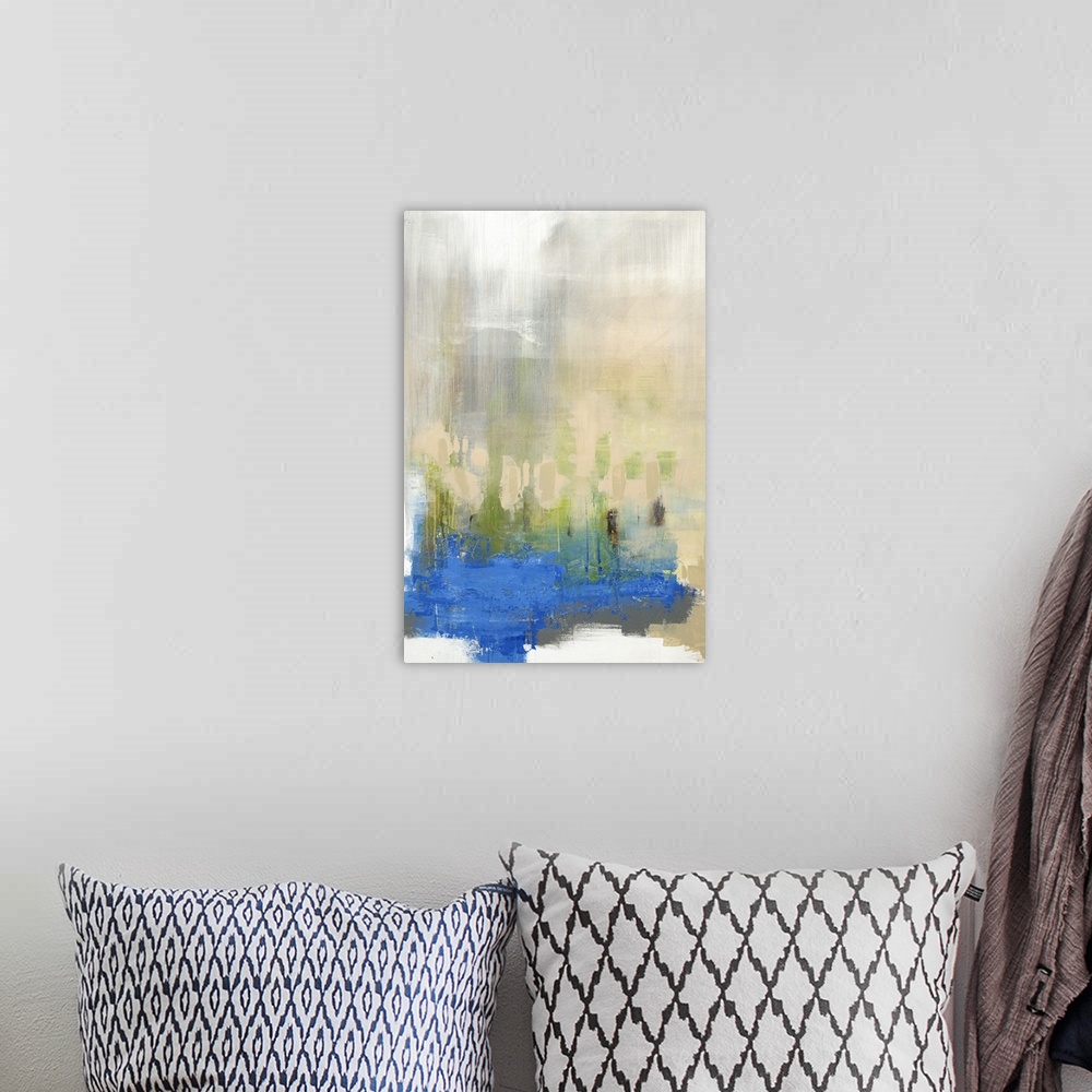 A bohemian room featuring Contemporary abstract painting with vivid blue on pale beige.
