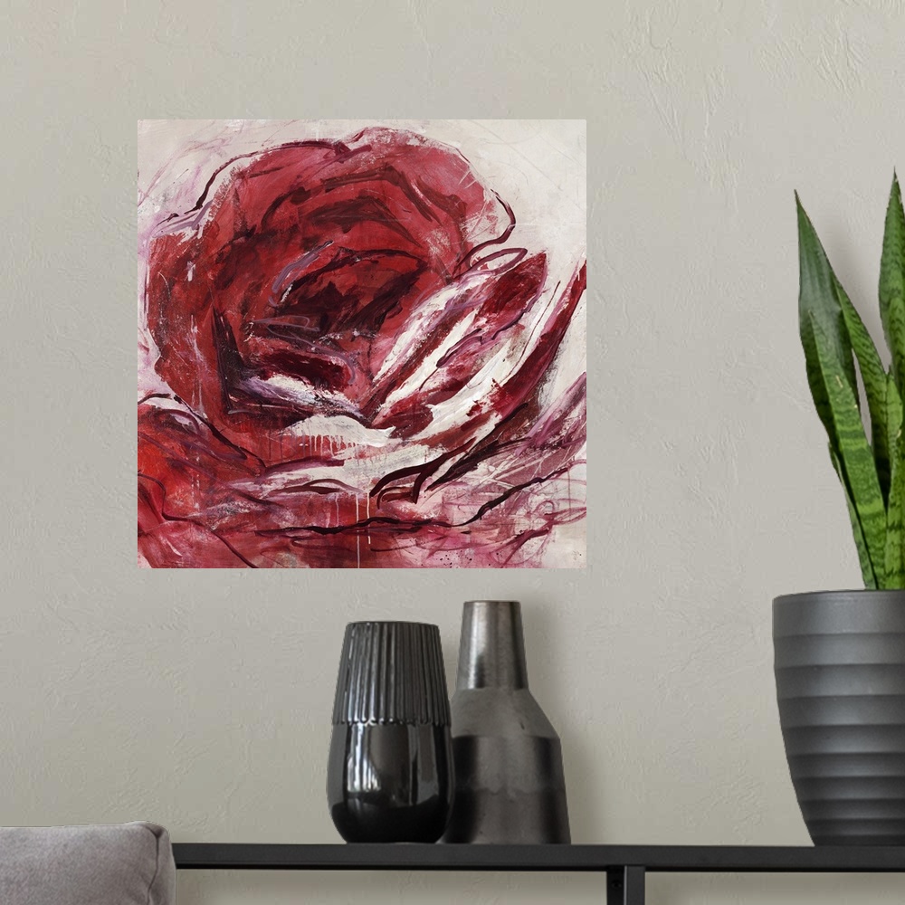 A modern room featuring Abstract painting of a red rose.