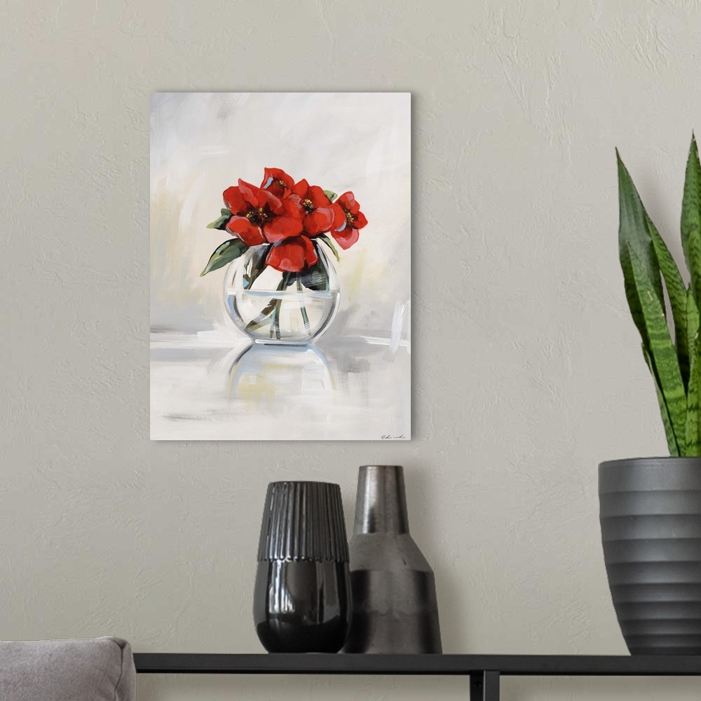 A modern room featuring Contemporary artwork of red poppies in a clear glass vase.