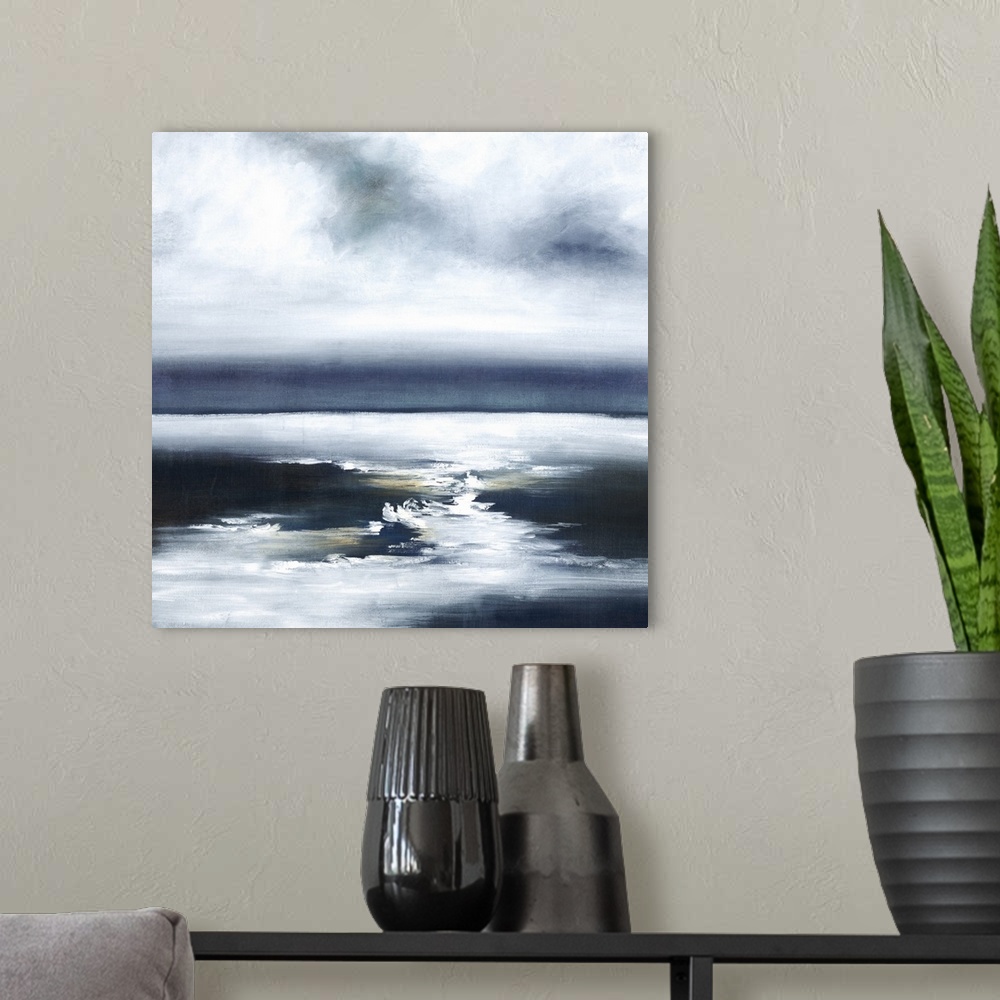 A modern room featuring Contemporary painting of a calm seascape with blue tones.