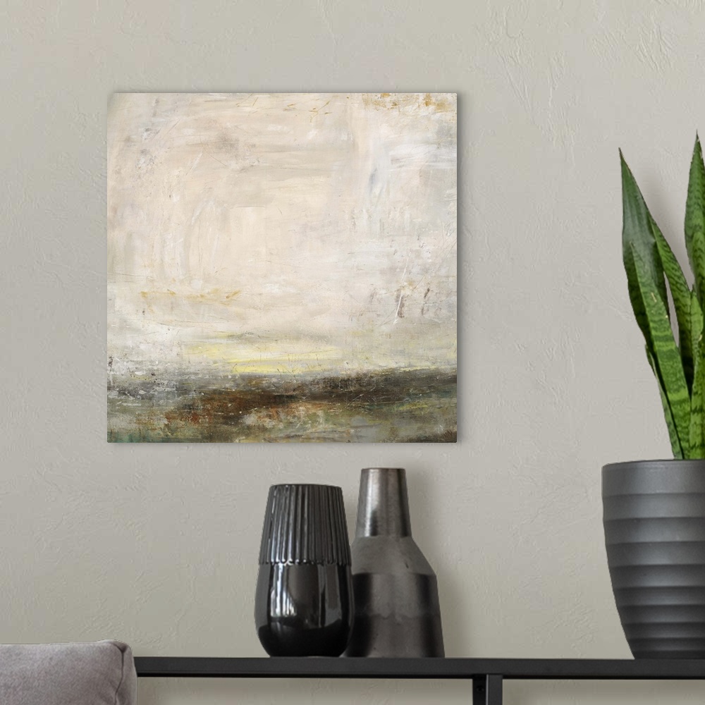 A modern room featuring Abstract painting of a bare landscape beneath a light, cloudy sky as the sun is setting on the ho...