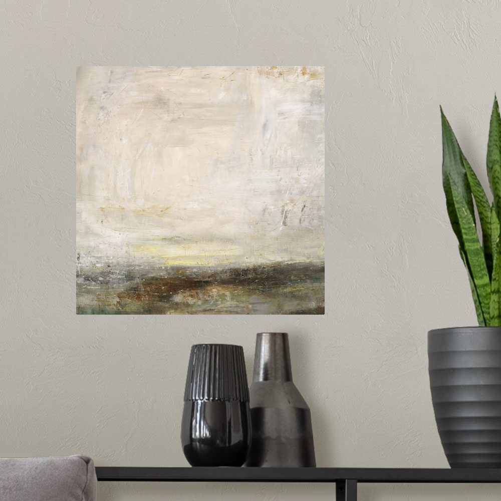 A modern room featuring Abstract painting of a bare landscape beneath a light, cloudy sky as the sun is setting on the ho...