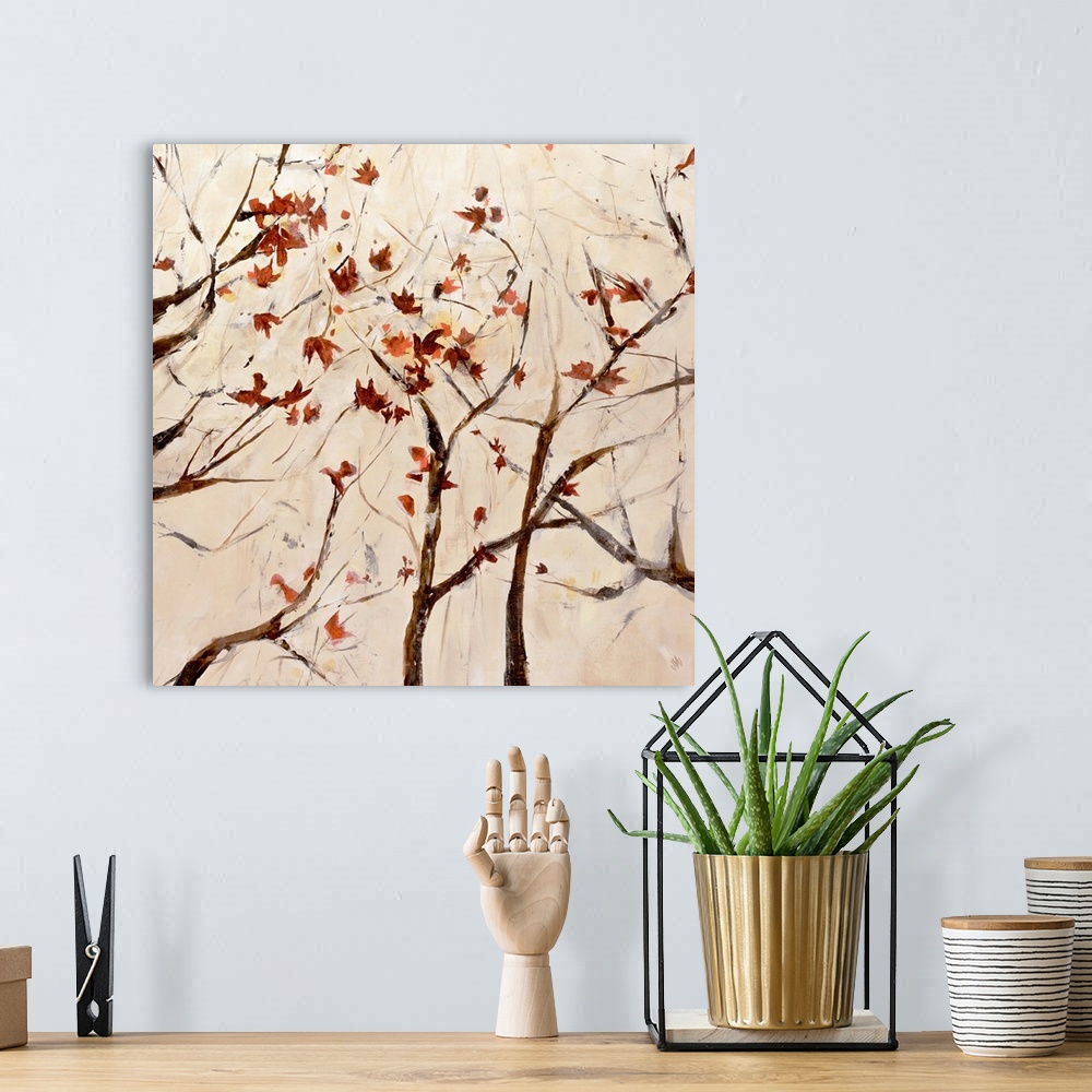 A bohemian room featuring Contemporary painting of several thin branched trees with scattered fall leaves.