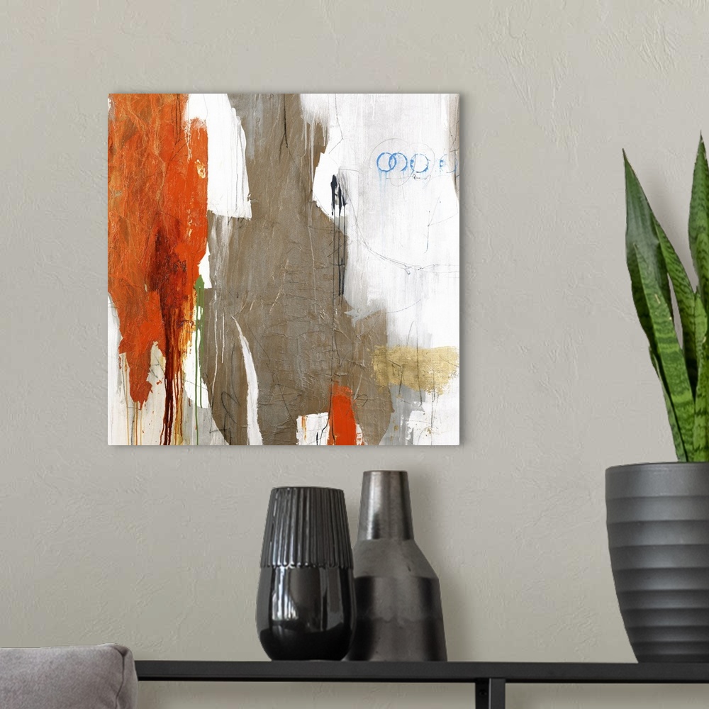 A modern room featuring Large abstract art with brown, orange, gray, white, blue, and green on a white background.