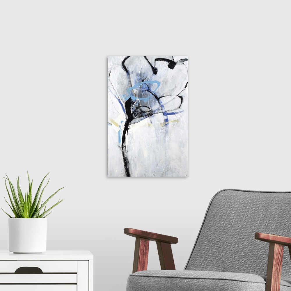 A modern room featuring An abstract floral painting with colors of blue and yellow along with the light gray background.