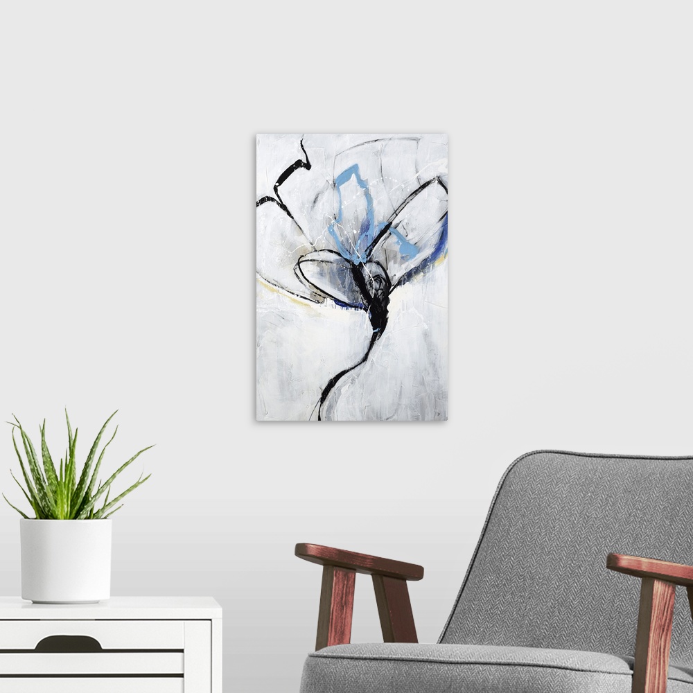 A modern room featuring An abstract floral painting with colors of blue and yellow along with the light gray background.