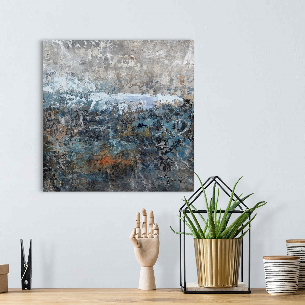 A bohemian room featuring Abstract painting using textured looking blue and gray tones to form what almost appears as a lan...