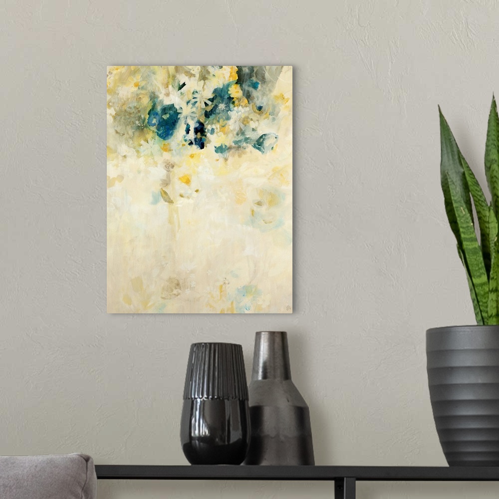 A modern room featuring Vertical, large home art docor of many small, golden flowers trickling downward and then fading i...