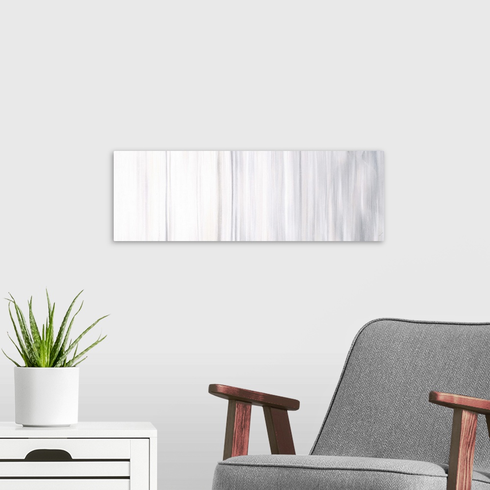 A modern room featuring Contemporary abstract artwork in shades of white and grey, getting dark from left to right.