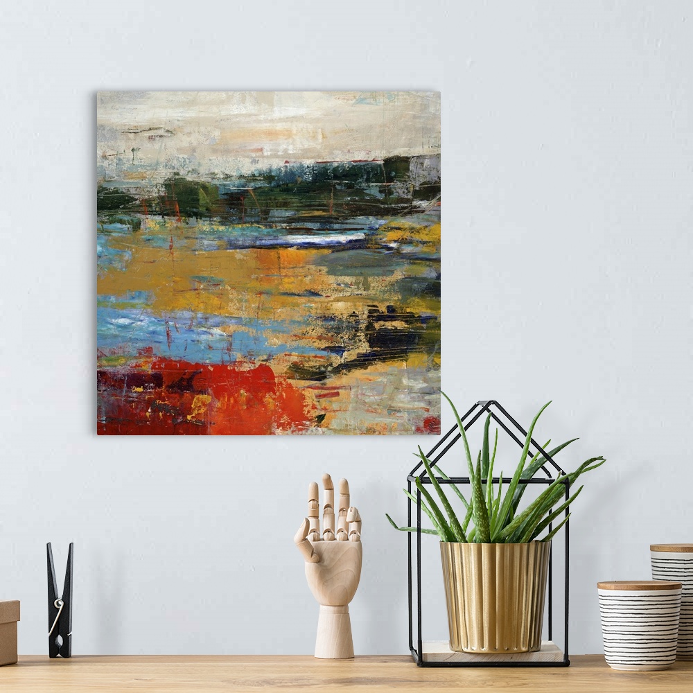 A bohemian room featuring Abstract landscape painting of a golden sunset along a vibrant shoreline.