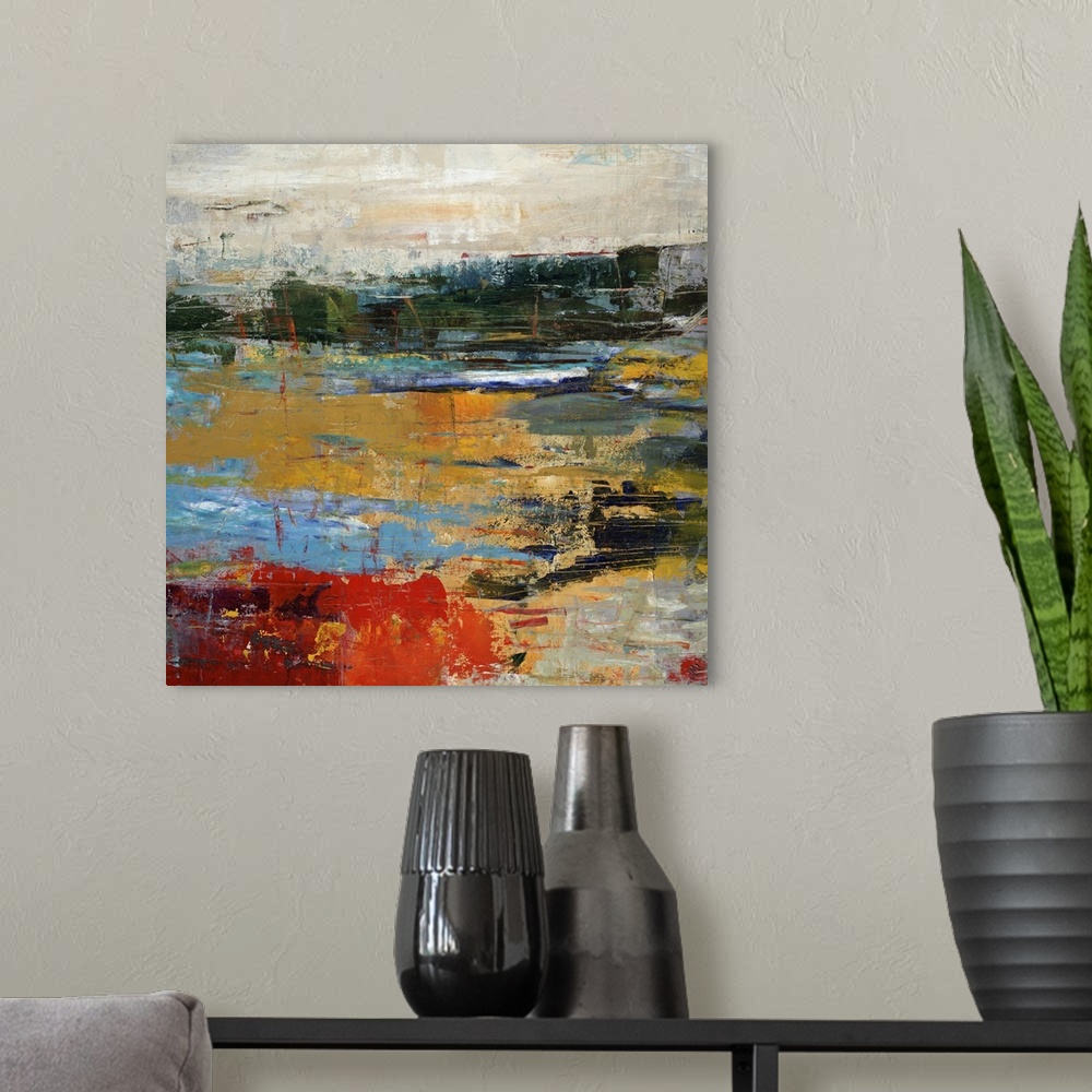 A modern room featuring Abstract landscape painting of a golden sunset along a vibrant shoreline.