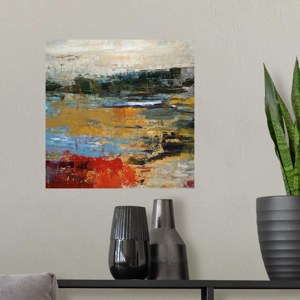 A modern room featuring Abstract landscape painting of a golden sunset along a vibrant shoreline.