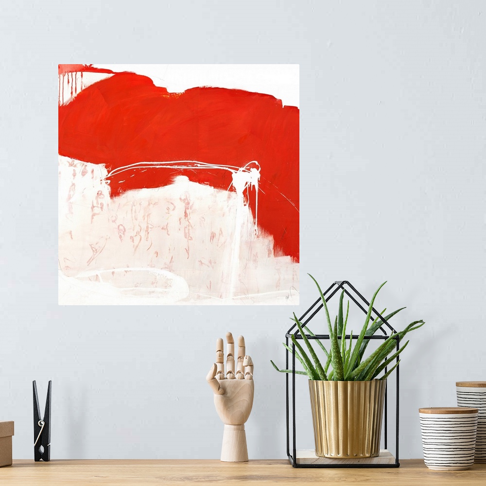 A bohemian room featuring Vibrant abstract painting on a square canvas.