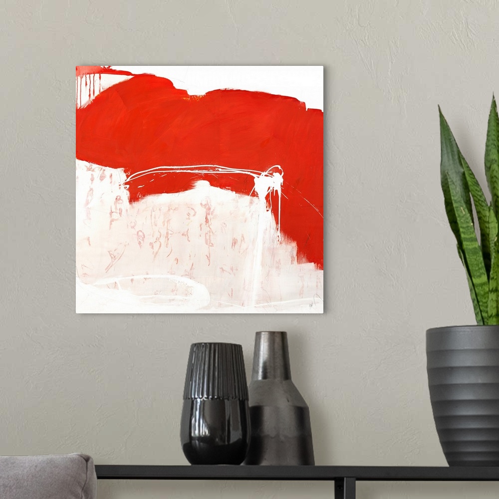 A modern room featuring Vibrant abstract painting on a square canvas.