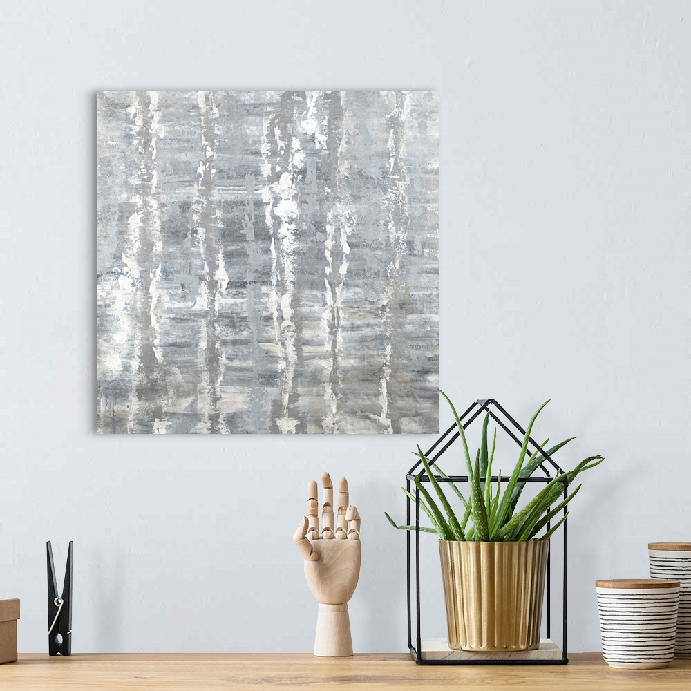 A bohemian room featuring Square abstract art with horizontal brushstrokes in the background and vertical lines in the fore...