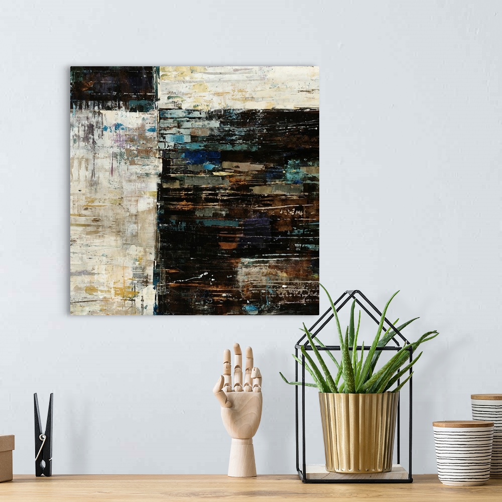 A bohemian room featuring Abstract painting on canvas of dark and light colored squares with different colored brushstrokes...