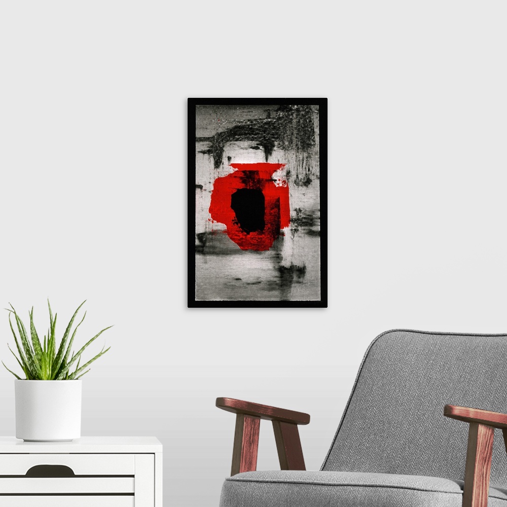 A modern room featuring Contemporary abstract painting made with dark black and gray hues, a bright red shape in the midd...