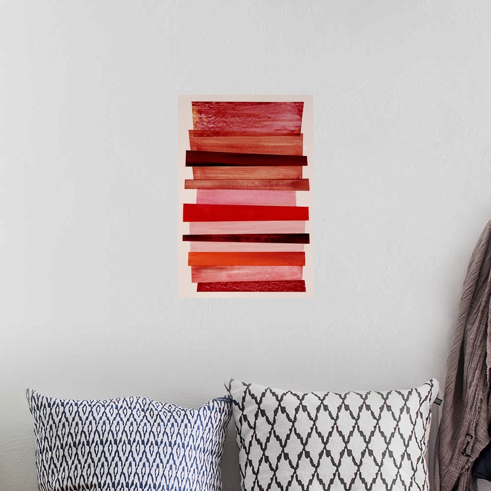 A bohemian room featuring Geometric abstract painting that has an off-white background and a mixture of red and pink differ...
