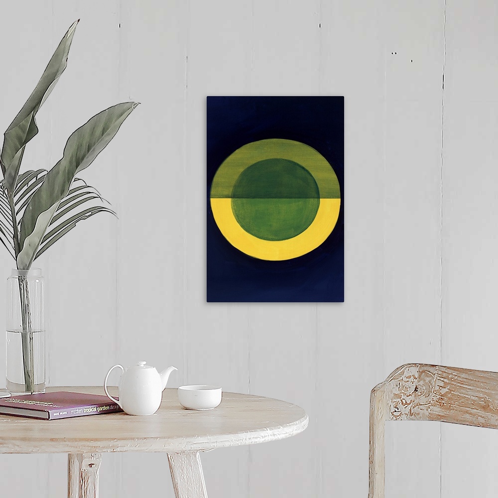 A farmhouse room featuring Geometric abstract painting with a dark blue background and a gold circle in the center with a bl...