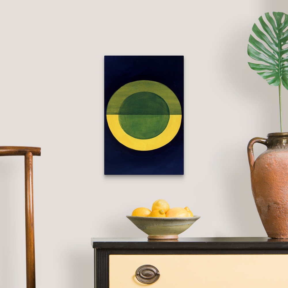A traditional room featuring Geometric abstract painting with a dark blue background and a gold circle in the center with a bl...
