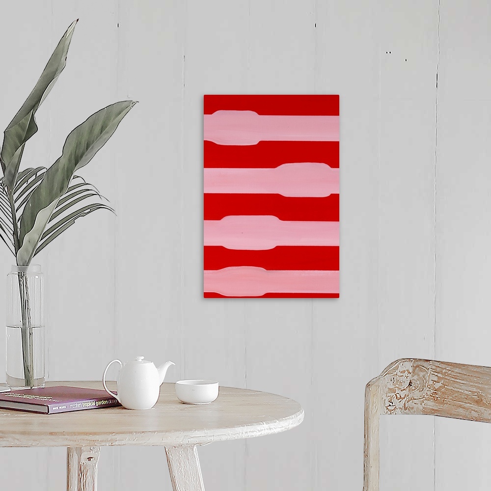A farmhouse room featuring Red and pink asymmetric abstract painting.