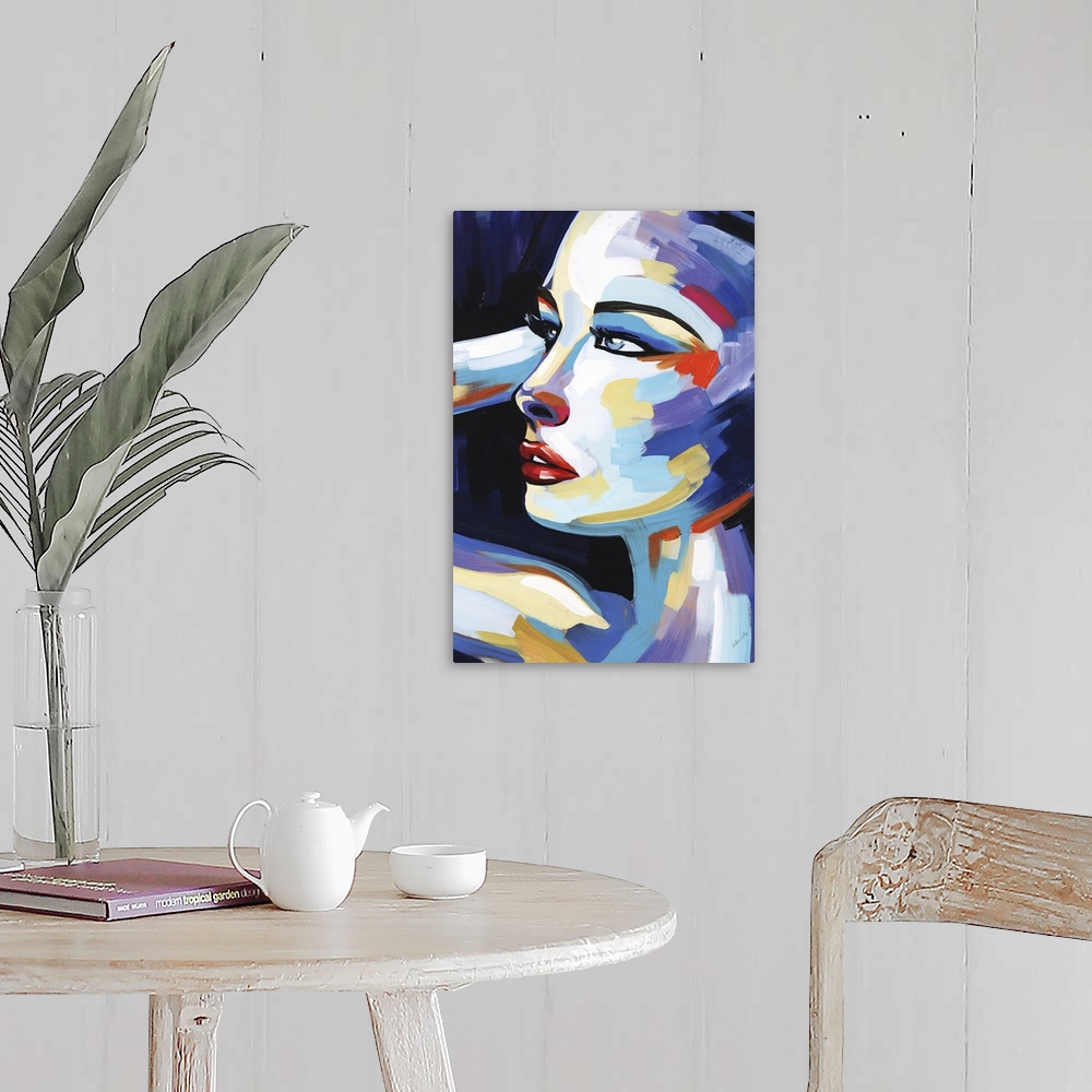 A farmhouse room featuring Abstract painting of a female creating a triangular shape with her arm, created with different co...