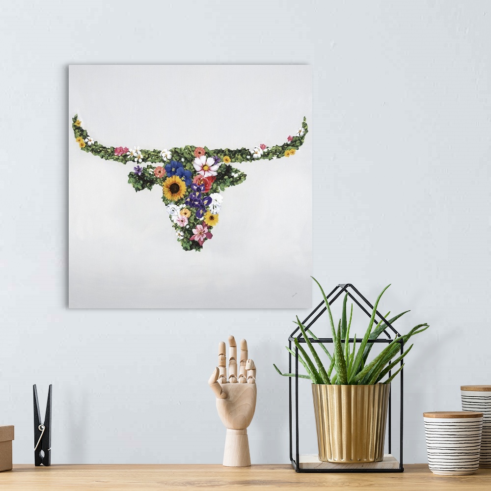 A bohemian room featuring Floral silhouette of a bull with horns.