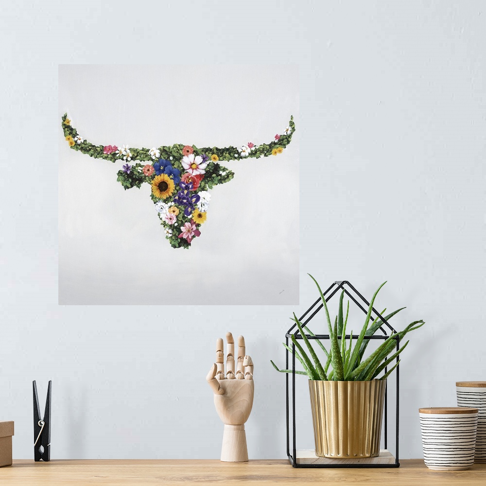 A bohemian room featuring Floral silhouette of a bull with horns.