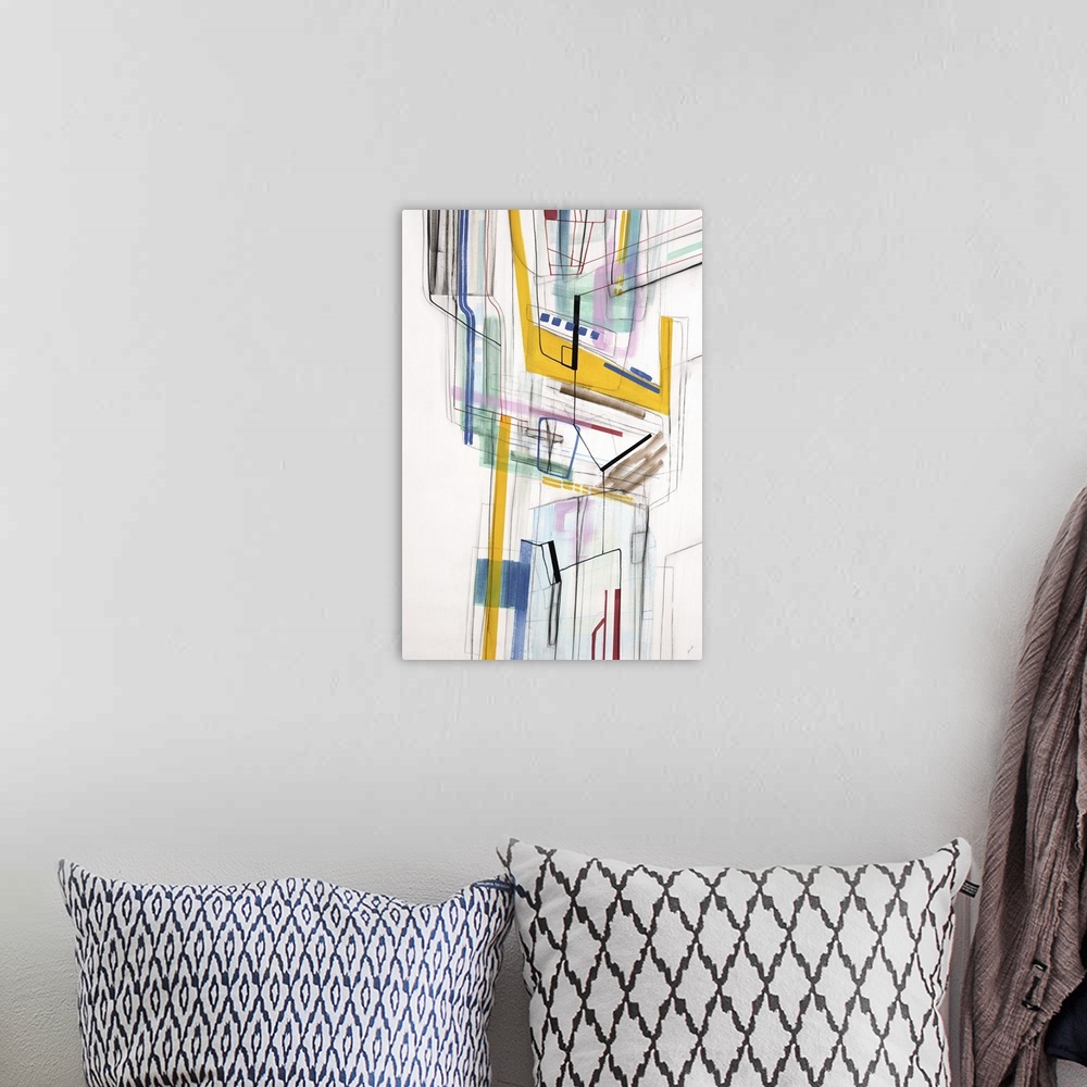 A bohemian room featuring Large vertical modern artwork of multi-colored lines interlacing.