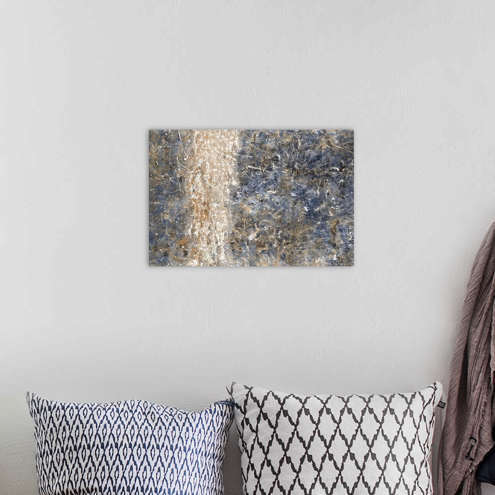 A bohemian room featuring Contemporary abstract artwork with bright white on dark textures.