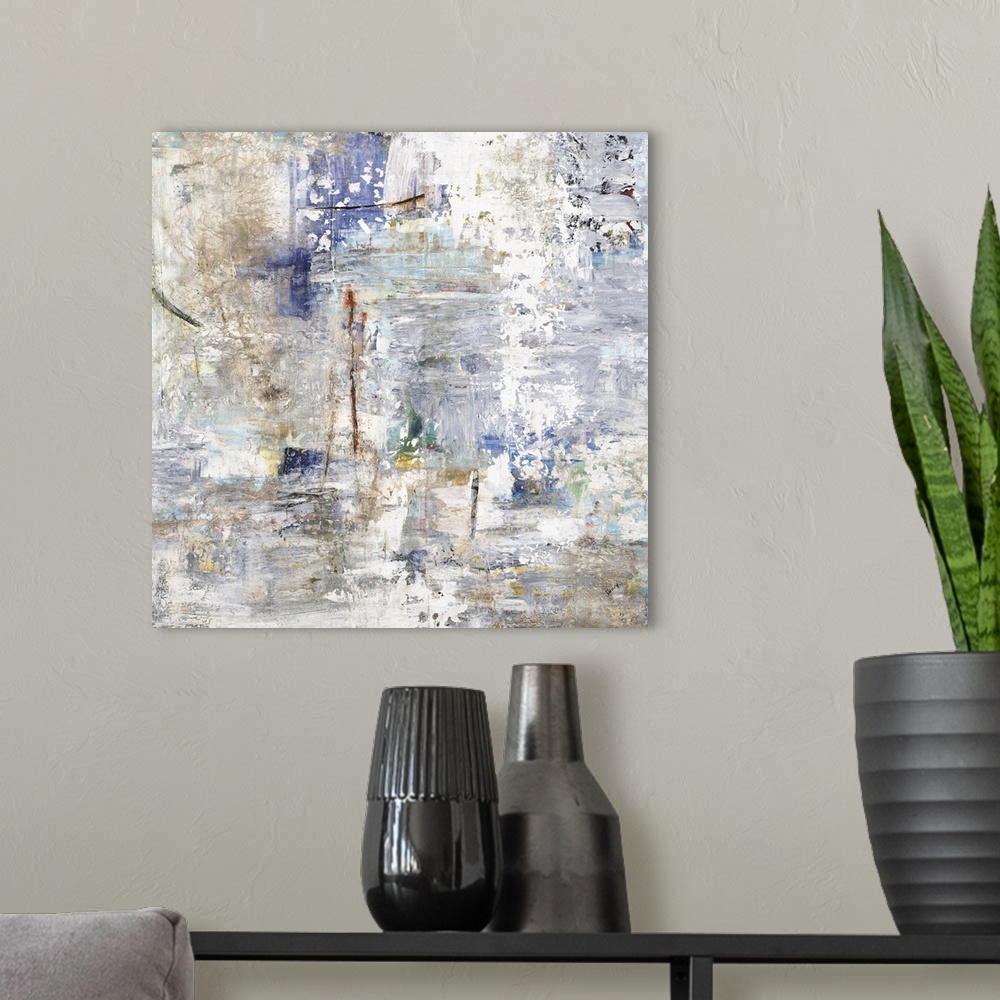 A modern room featuring Large square abstract painting with cool tones and busy rough textures.