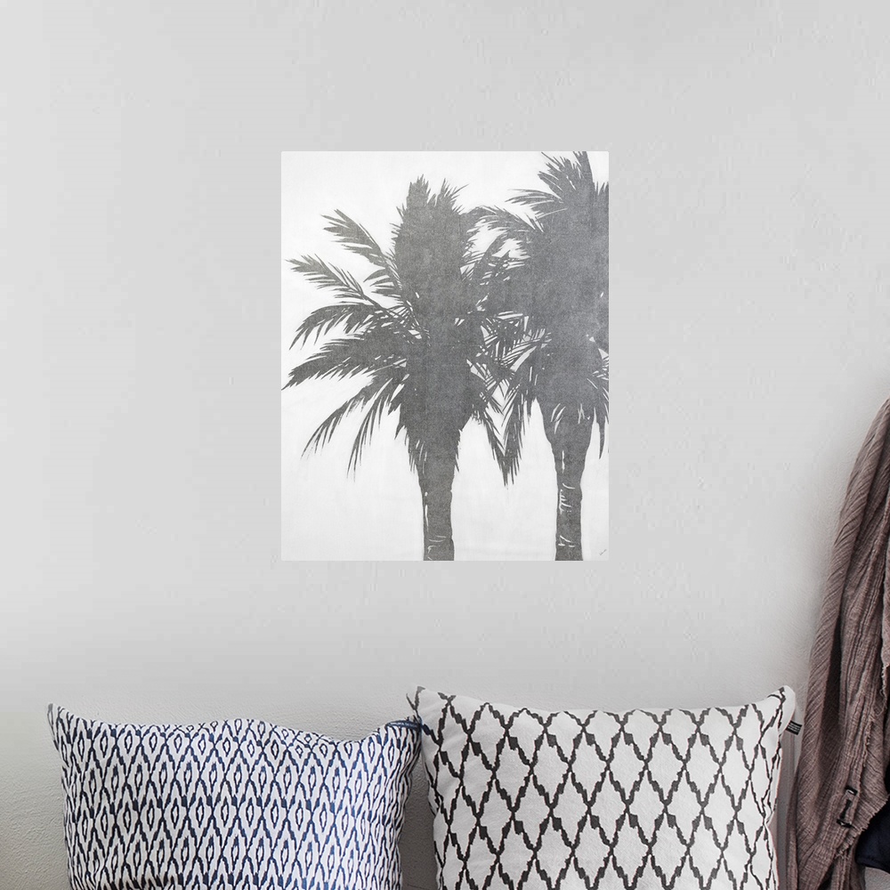 A bohemian room featuring Vertical painting of palms trees in sliver.