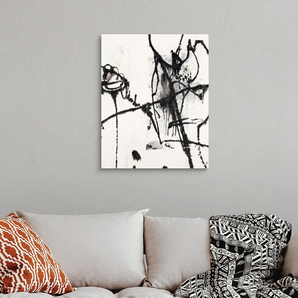 A bohemian room featuring Contemporary abstract painting of black painted lines against a white background.