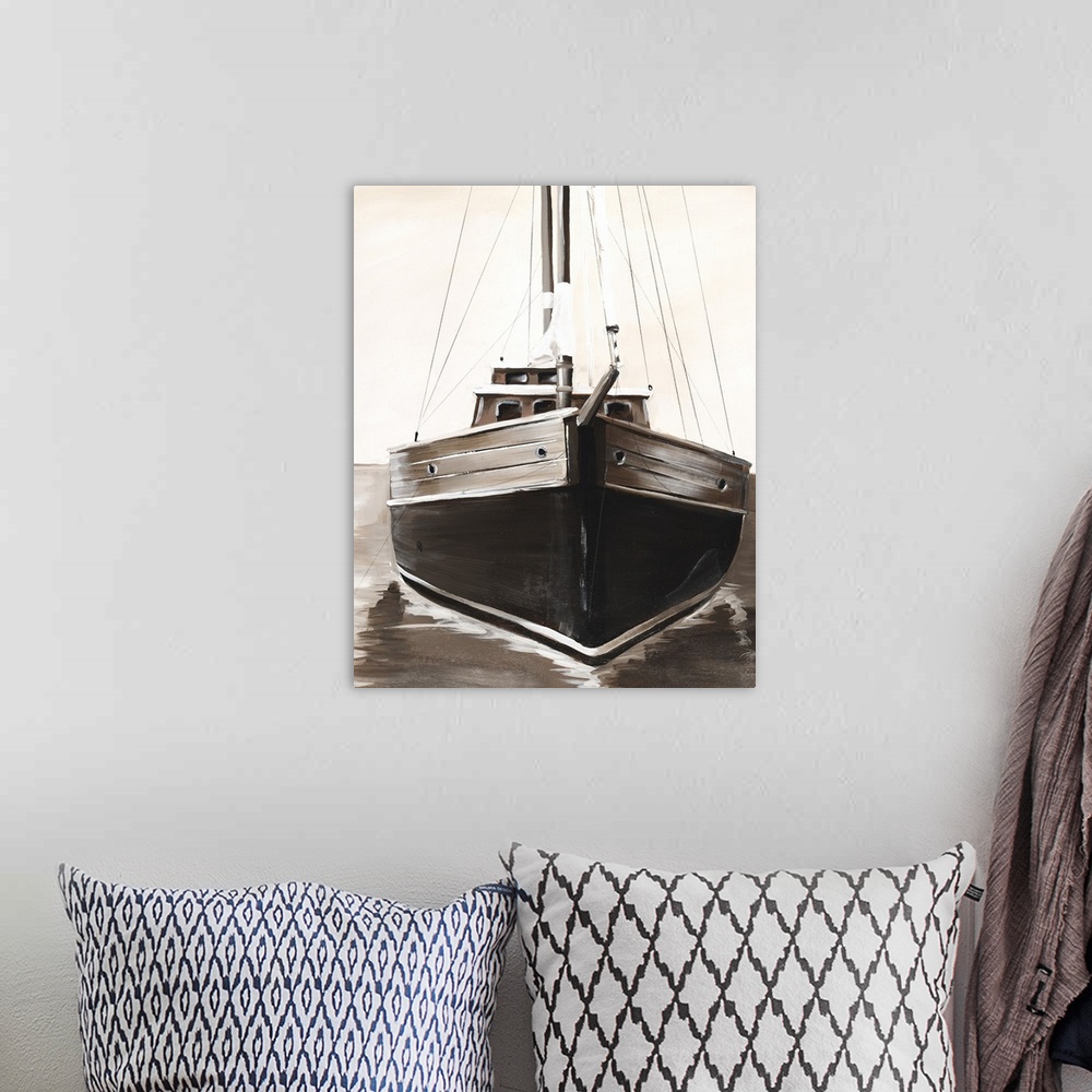 A bohemian room featuring Sepia toned painting of the front of a sailboat.