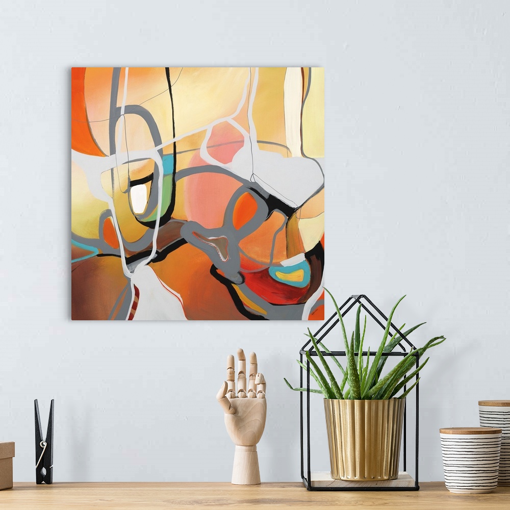 A bohemian room featuring Square abstract art with bright, warm hues on the background with gray winding lines bringing dep...