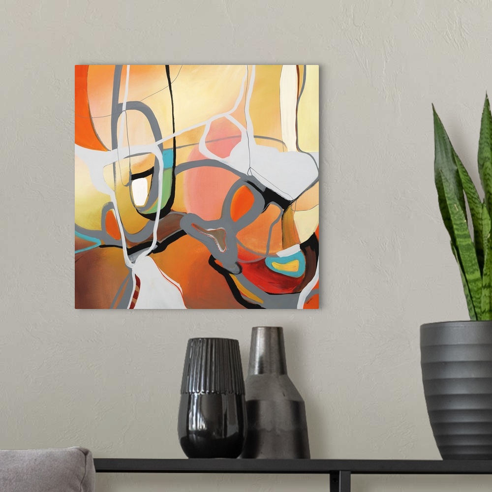 A modern room featuring Square abstract art with bright, warm hues on the background with gray winding lines bringing dep...